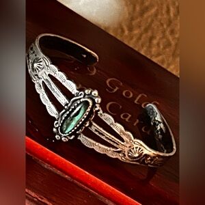 vintage Fred Harvey Era sterling silver and a green turquoise stone